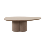 Wyler coffee table with circular top and sculptural petal-shaped base, a modern centerpiece for stylish living rooms